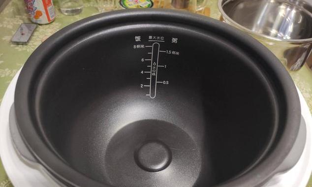 电饭煲老粘米问题的解决方法（解决电饭煲老粘米问题的实用技巧）
